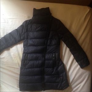 Navy blue light weight knee length puffer.